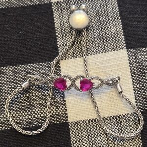Elegant Silver Bracelet with Pink Accents